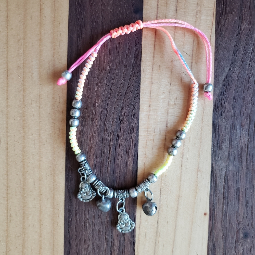 Buddha adjustable bracelet with bells pink yellow
